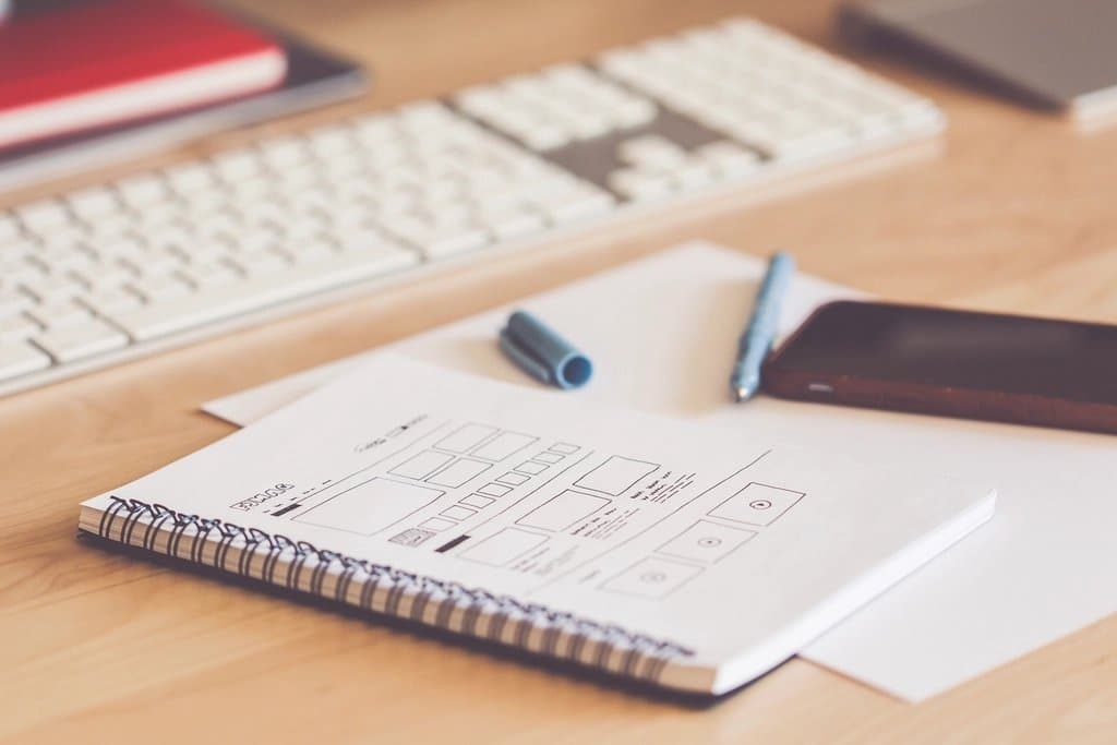 Figma-to-Code MCP Server — UI wireframe sketches on a desk